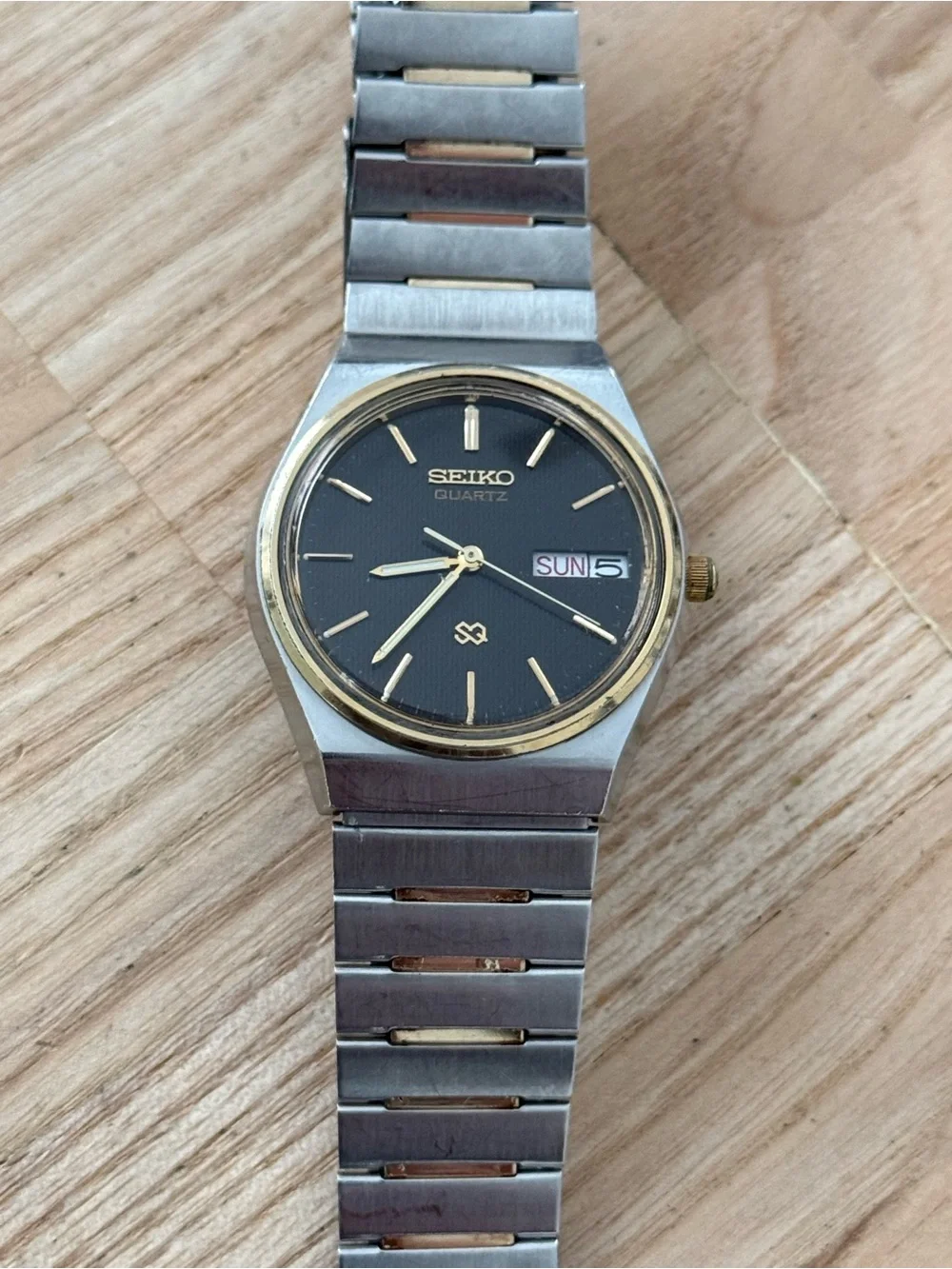 Seiko SQ Vintage Watch Gold Plated Bezel and Bracelet Black Dial Date Window
